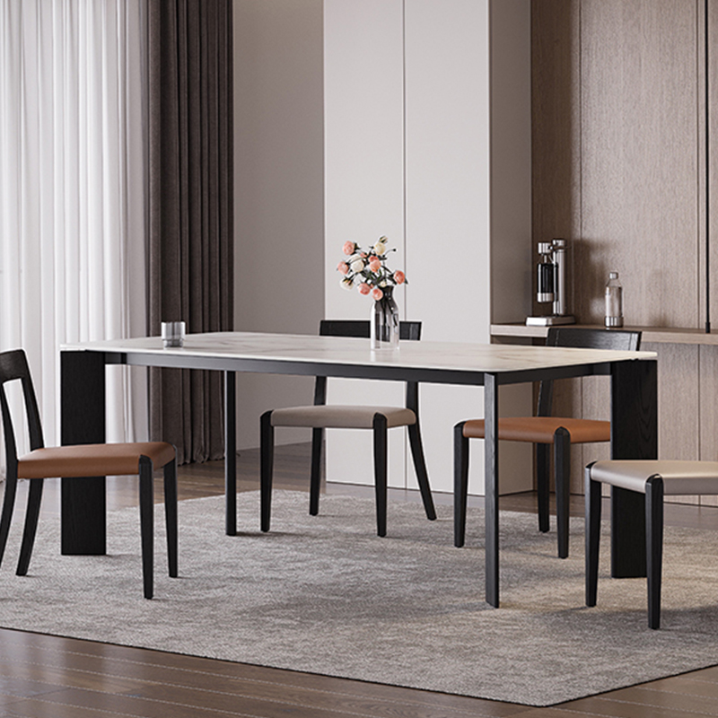 How can a dining table achieve a perfect balance between visual lightness and structural stability with its slim profile?